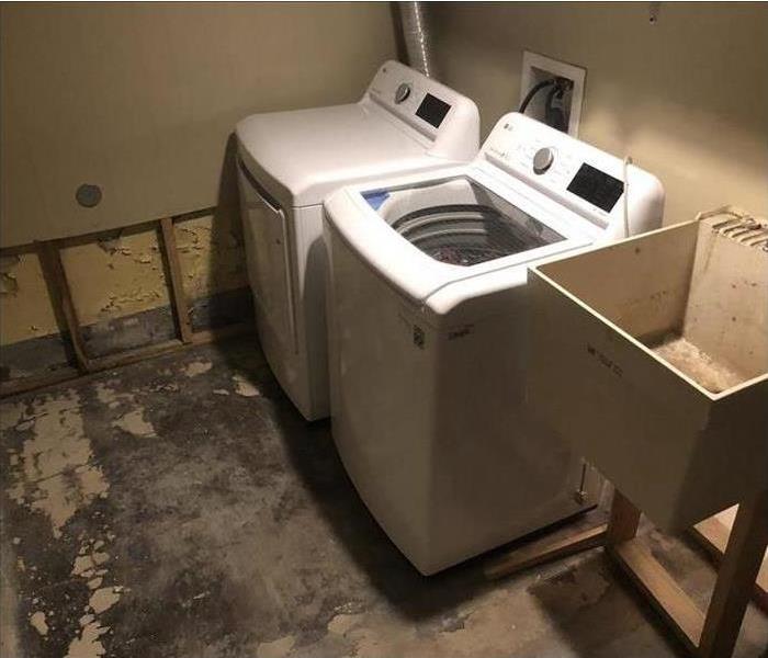 washer/dryer/sink, removed floor and wall